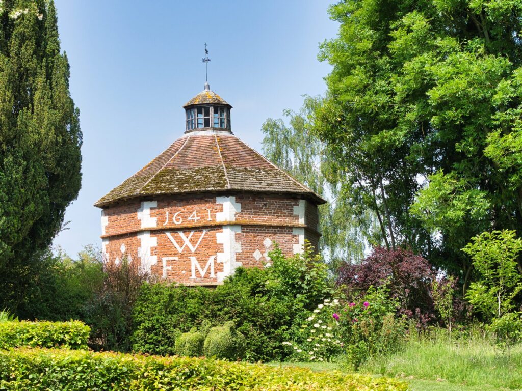 Octagonal dovecot set amongst trees